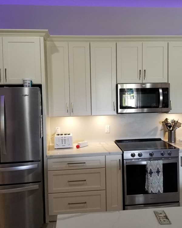 Antique White finish - kitchen scene with cabinet door