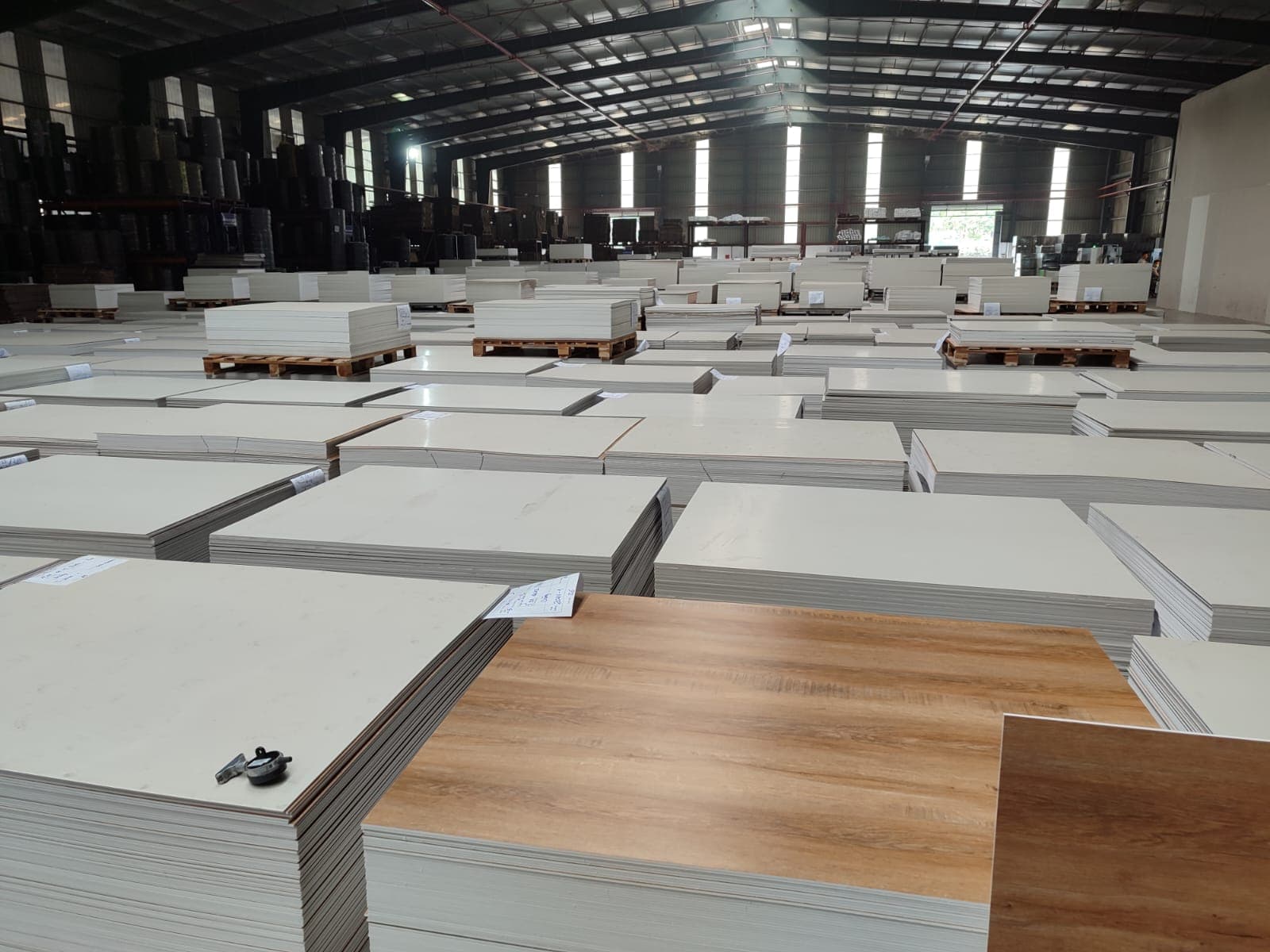 Glide-Lock Luxury Vinyl Plank Flooring panels at the factory