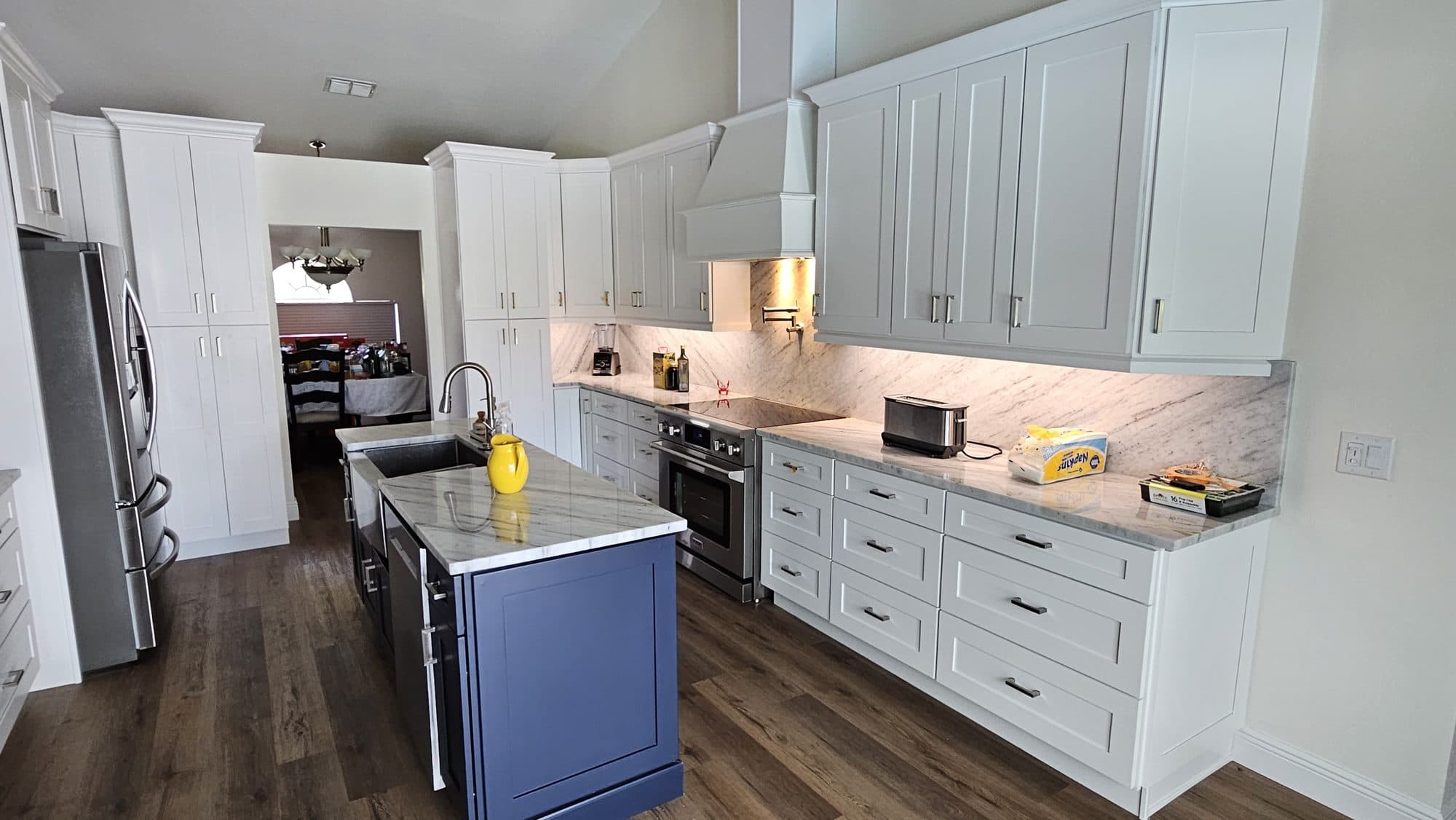 White Kitchen with Blue Island