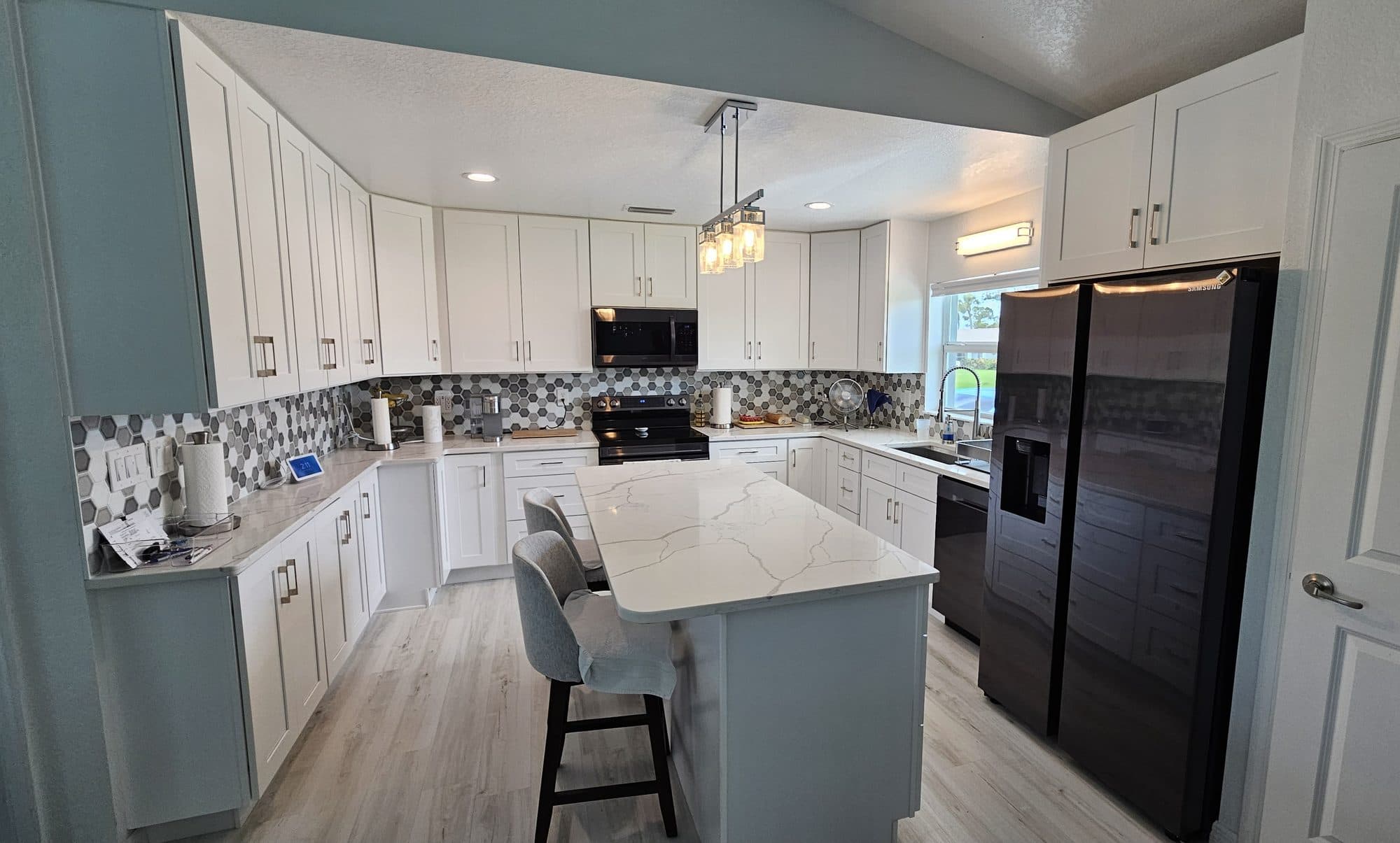 White Shaker Kitchen with Gray Island