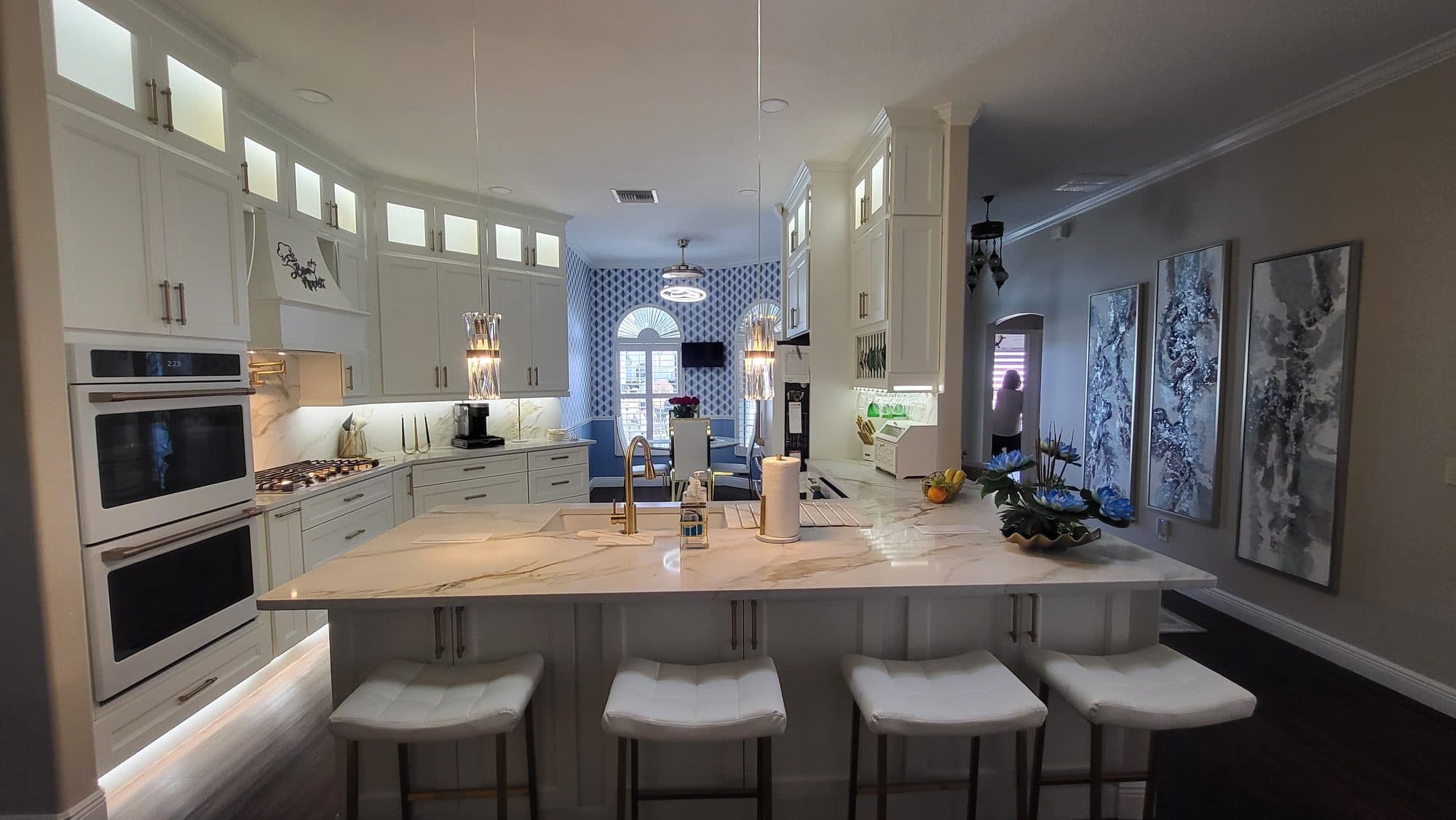 White Kitchen with Lighted Glass Uppers