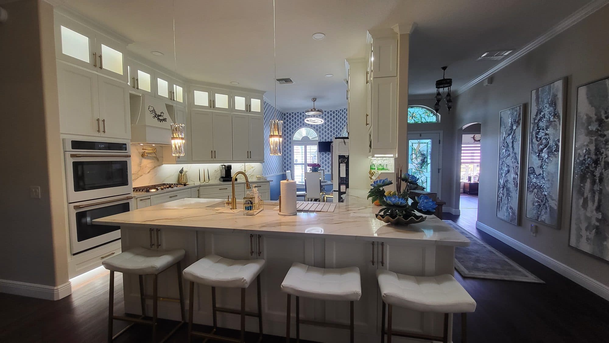 Open White Kitchen with Island Seating