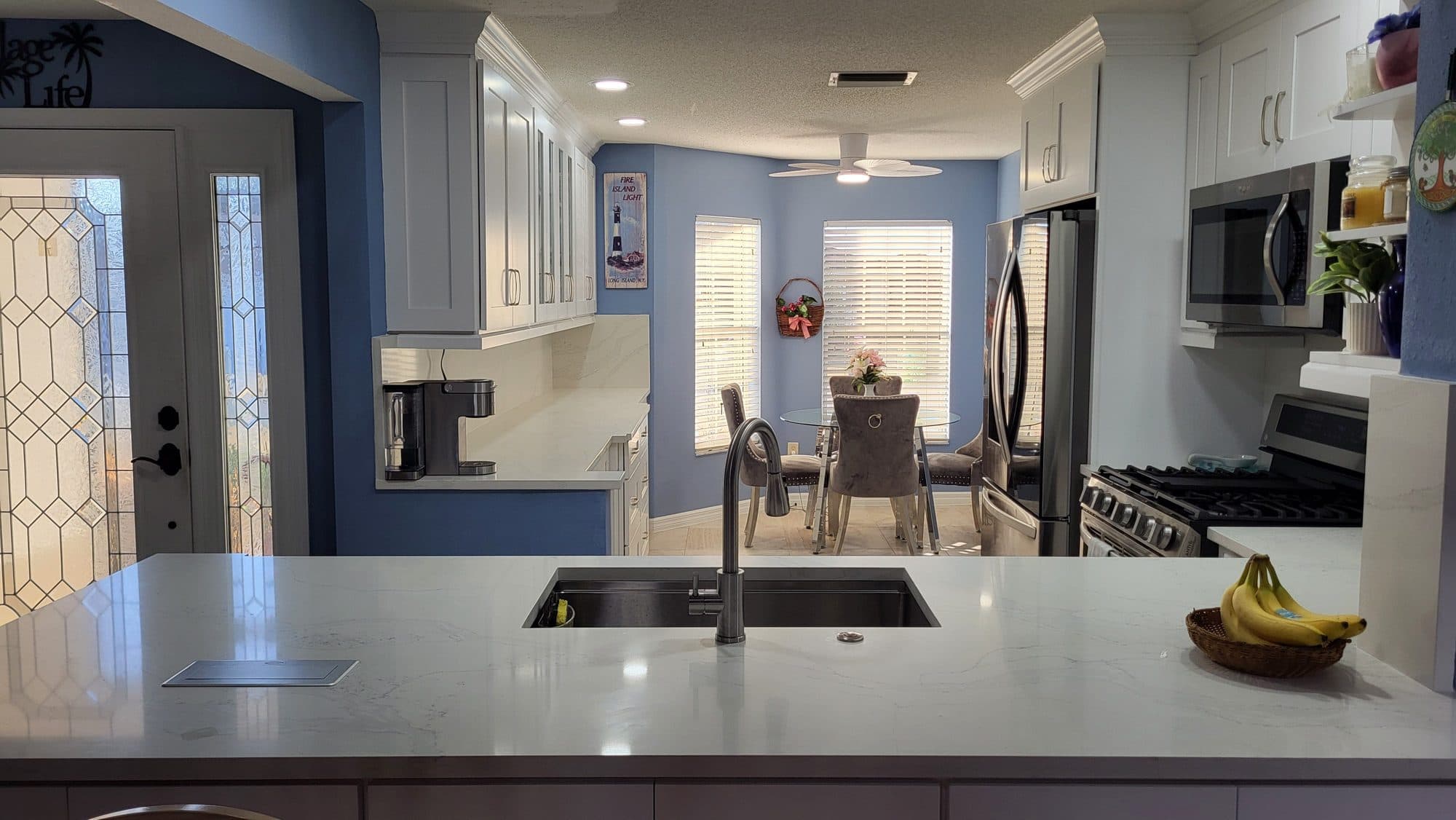 White Kitchen with Quartz Peninsula