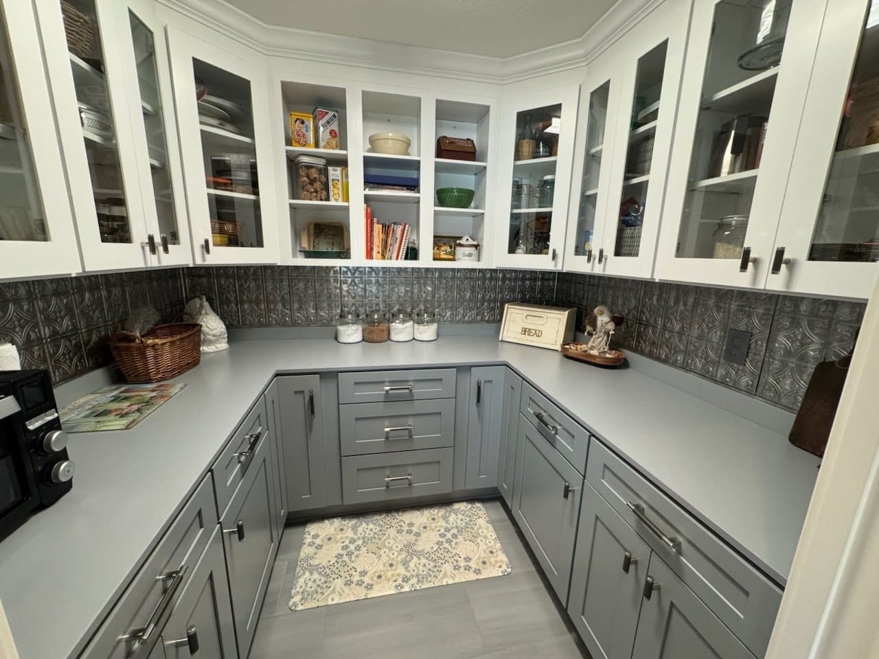 Gray Shaker U-Shaped Kitchen with Glass Uppers