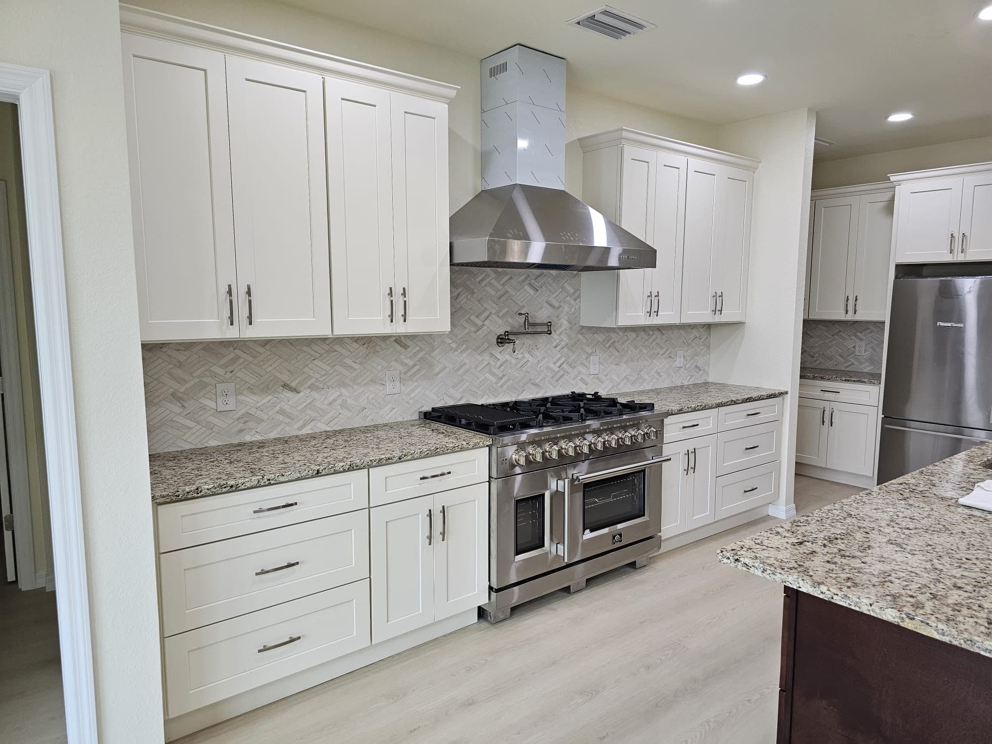 White Kitchen with Professional Range