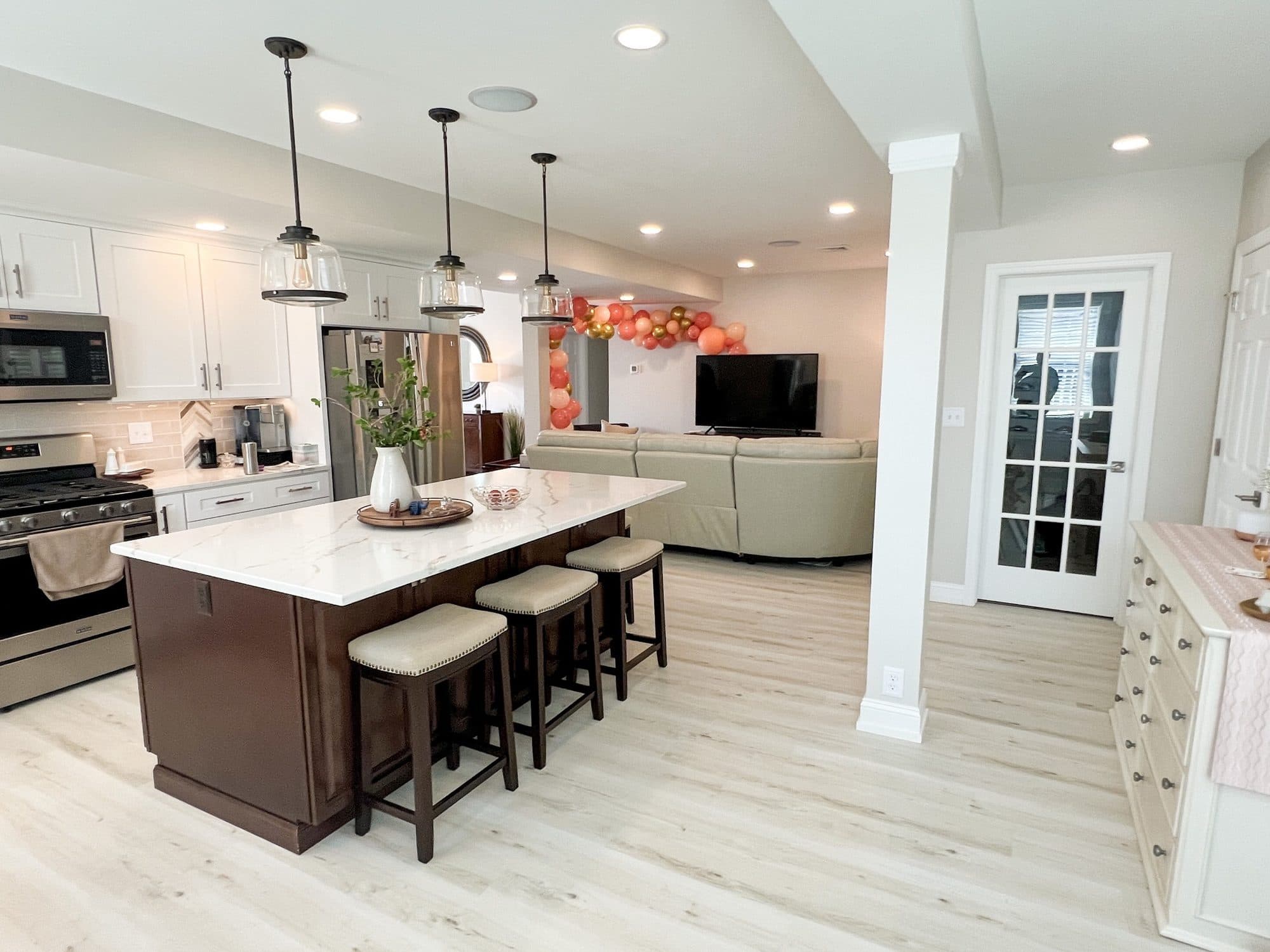 White Kitchen with Espresso Island Seating