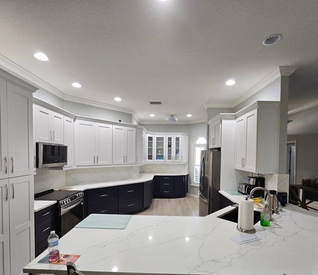 White and Navy Kitchen with Quartz Counters