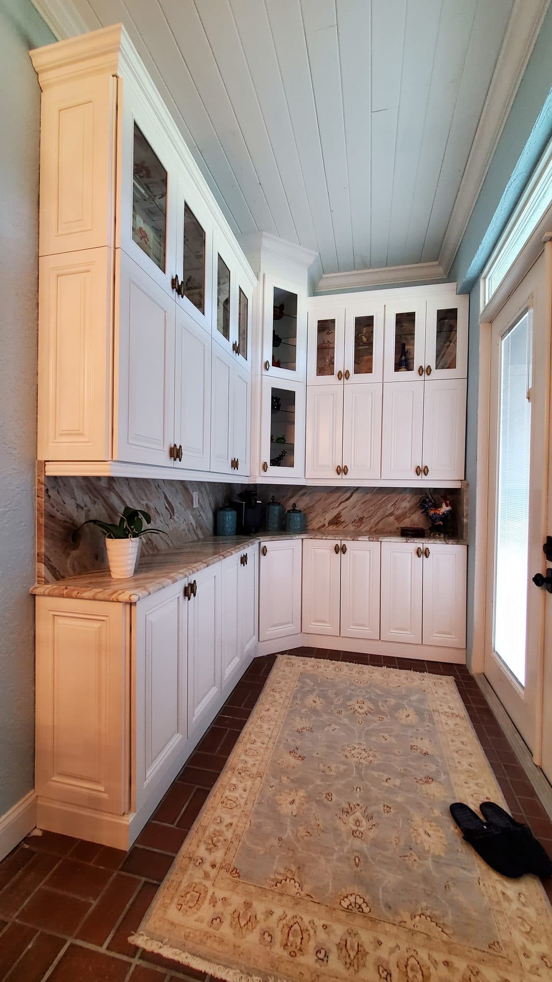 White Galley Kitchen with Glass Uppers