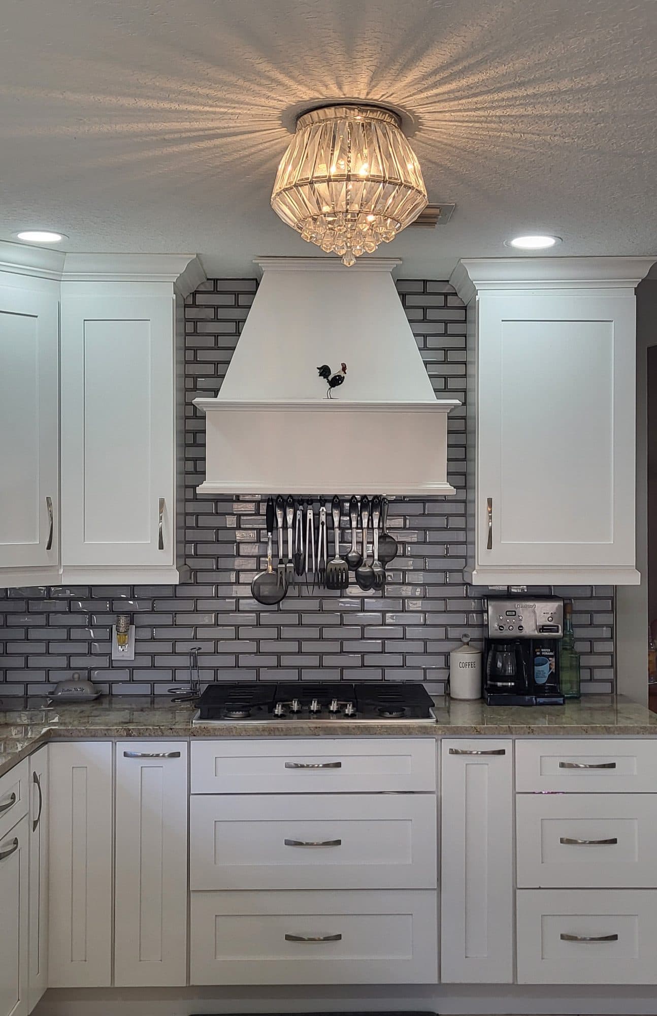 White Kitchen with Custom Range Hood