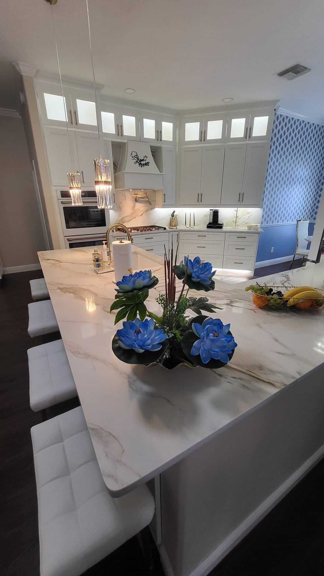 Marble Island with White Cabinets