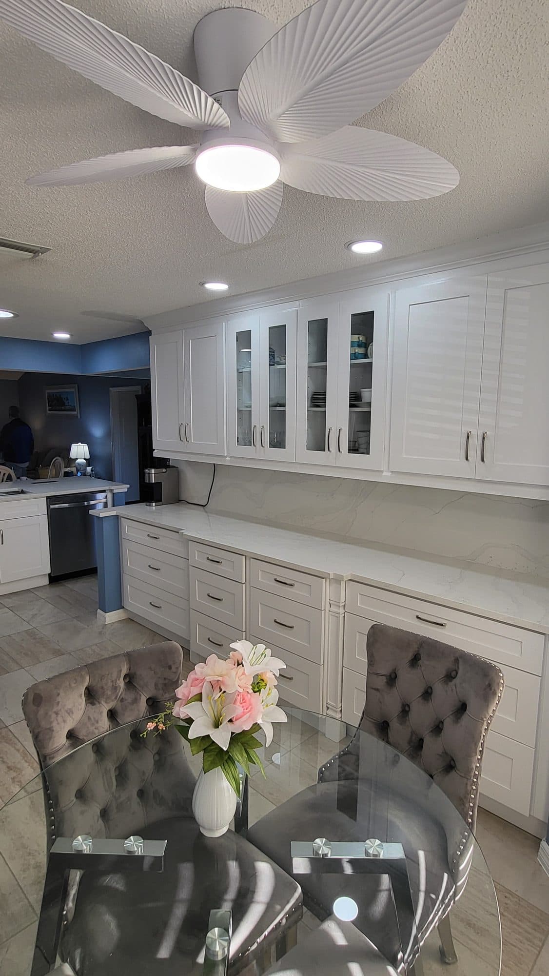 White Kitchen with Louvered Cabinet Doors
