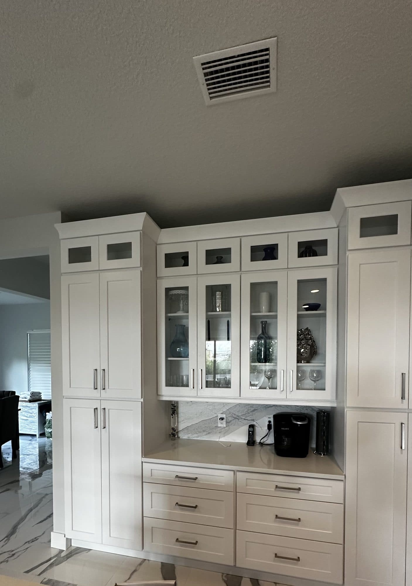 White Kitchen with Glass Display Cabinets