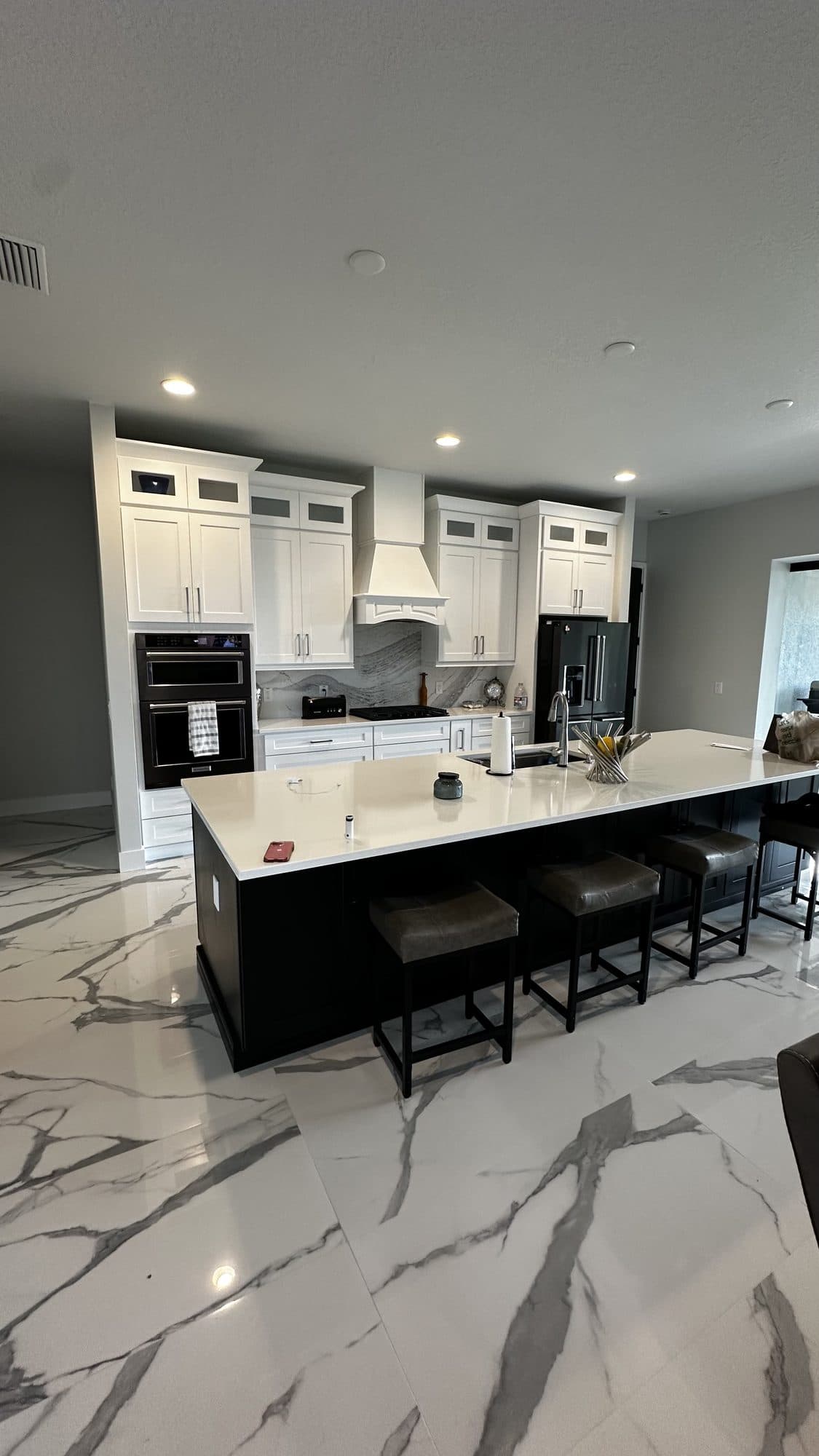 White Kitchen with Black Island