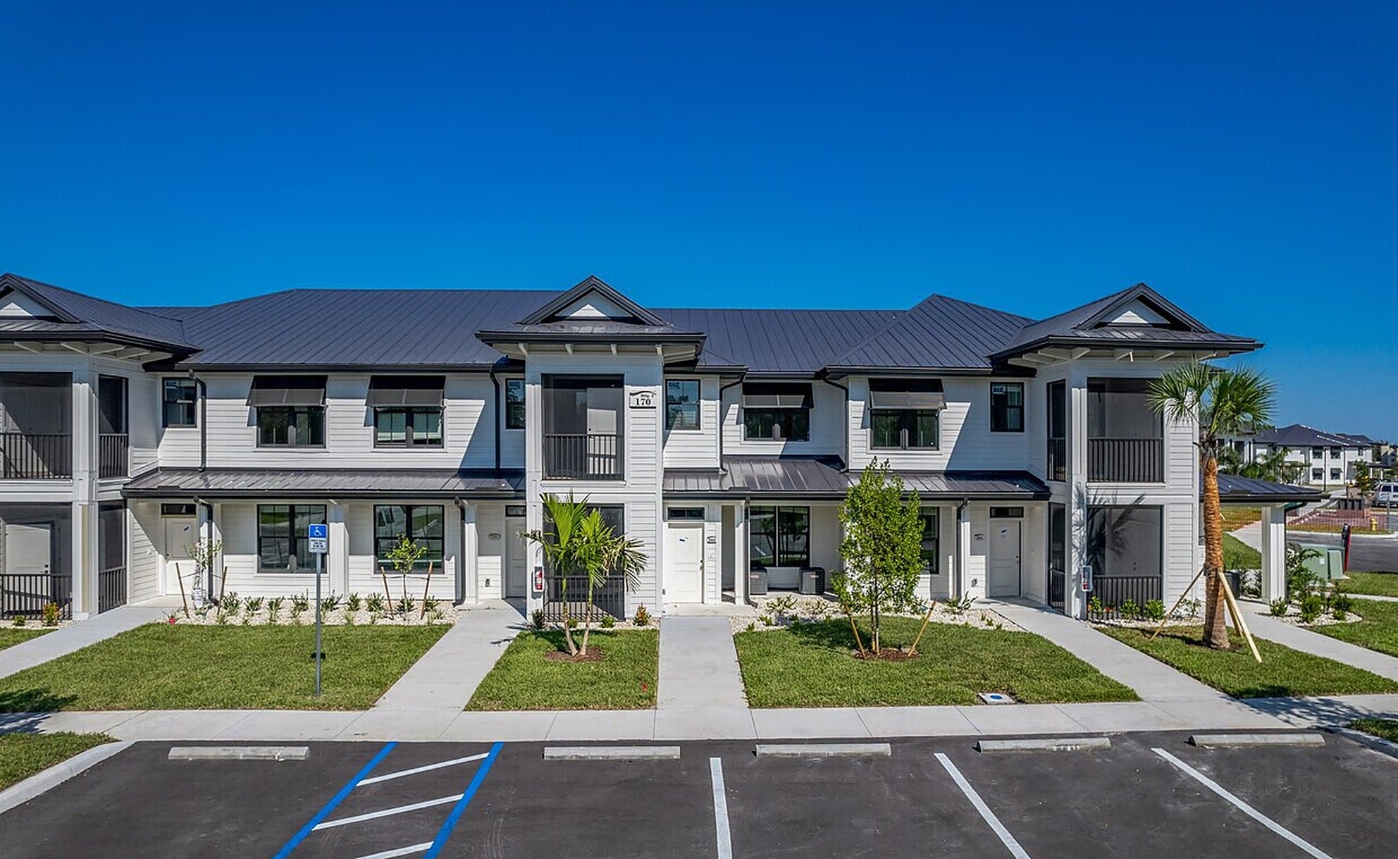Front of an apartment building at The Waterfront on Hatchett Creek