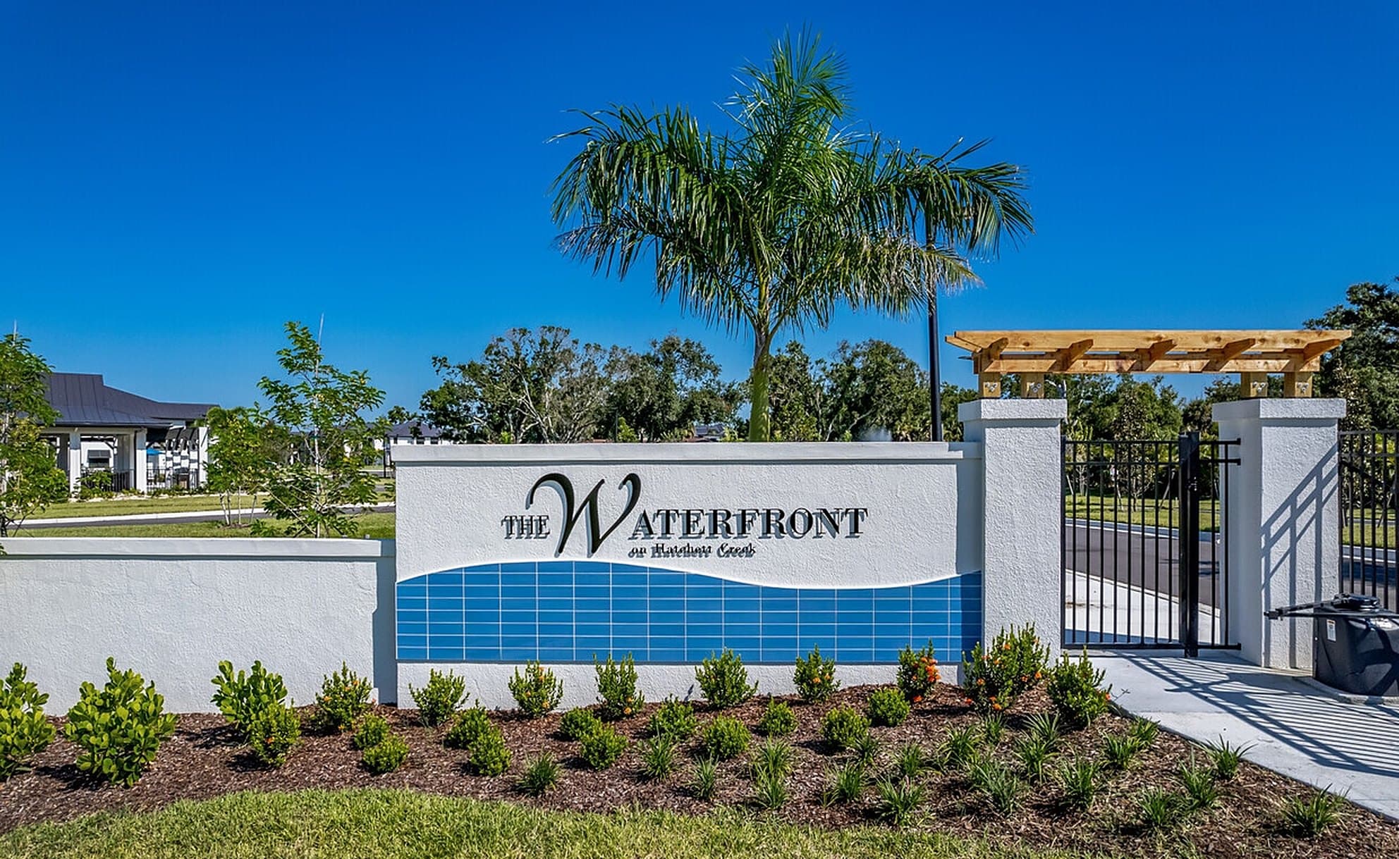 The Waterfront on Hatchett Creek entrance monument sign
