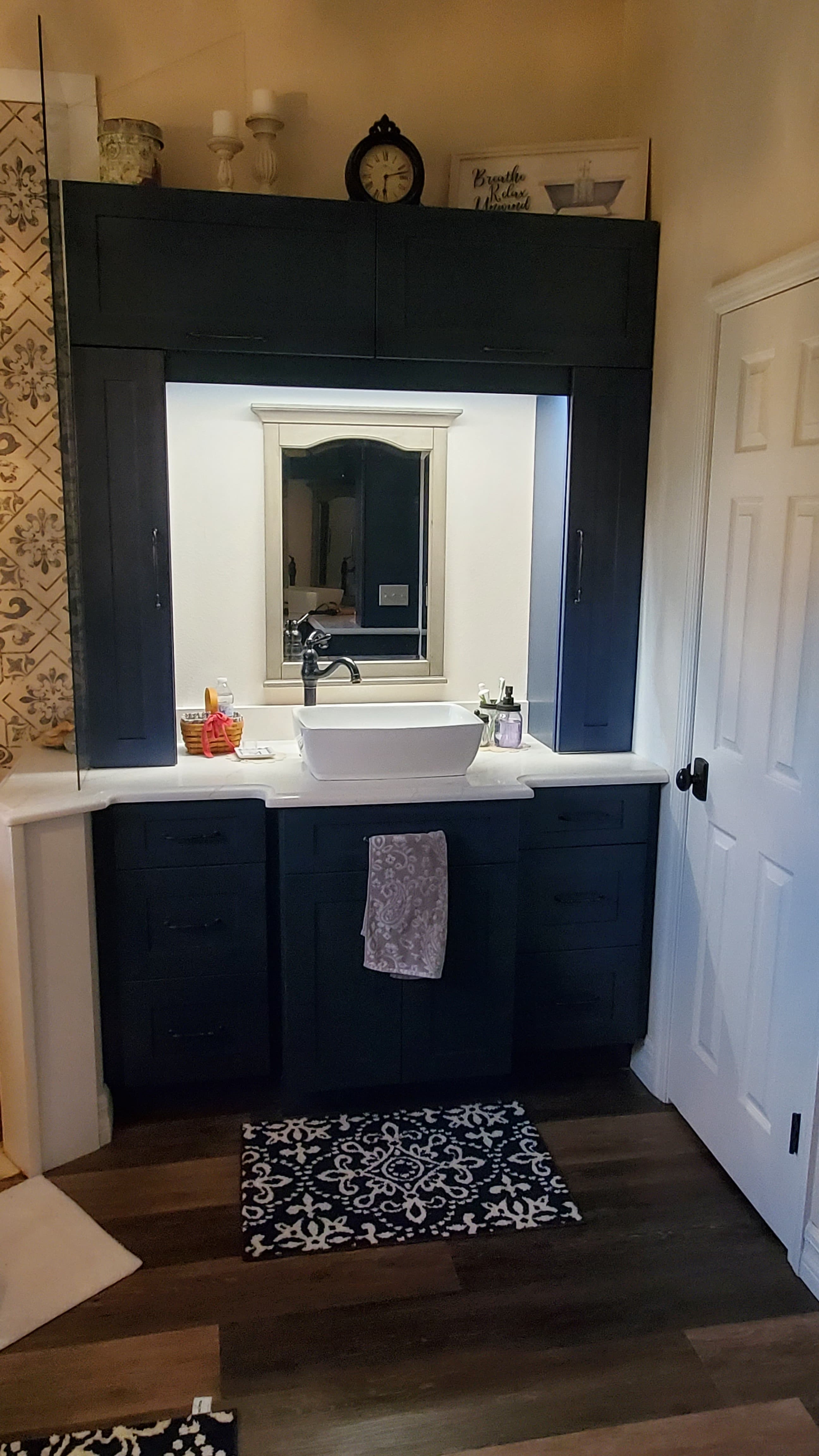 Navy shaker vanity with vessel sink